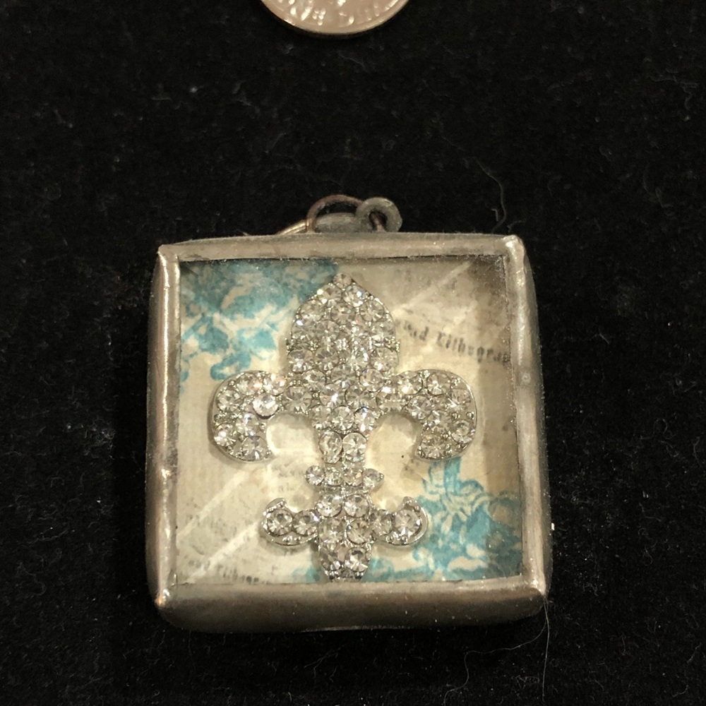 Fleur de lis peacock charm